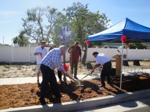 Bellflower Mayor Santa Ines and city council members prepare to finish the official tree planting over on Virginia Street on Wednesday.  Tammye McDuff Photo