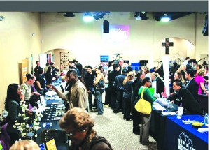 Job seekers talk to recruiters at last year's job fair. The Los Angeles County Job Fair will be held at Light and Life church in Downey, Tuesday August 26th beginning at 10:00 am.  