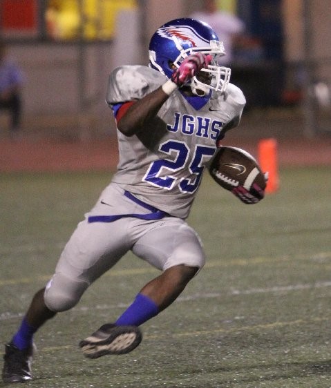 PHOTO BY ARMANDO VARGAS:   John Glenn senior running back Jamal Burns has a lot of space to gain some of his 101 yards in last Thursday night's 14-7 opening-season loss to Magnolia. Burns scored Glenn's lone touchdown, a 63-yard run nearly midway through the first quarter. 