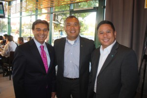 Cerritos Mayor Mark Pulido (left) and Artesia City Councilman Ali S. Taj (right) joined Armin Reyes (center) at a Cerritos College campaign fundraising event this past week.  Randy Economy Photo