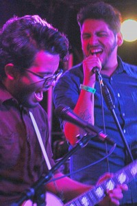 Lead Vocalist Ralph Tafoya (left) and Lead Guitarist Julio Quijano (right) give a screaming performance to fans at Slide Bar in Downtown Fullerton. Daniel E. Beckham Photo. 
