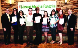 Lakewood Mayor Todd Rogers (left) with some of the recipients of the funds from the Lakewood Education Foundation.