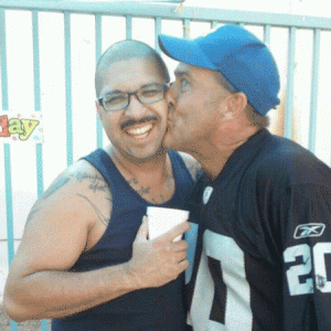 John Soria (left) with an unidentified friend at a football party.