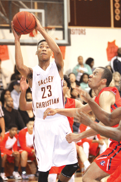 Valley Christian junior forward Ronald Massey goes up for a shot in the first half against Maranatha in last Friday night's California Interscholastic Federation-Southern Section Division IV-A semifinal game. Massey led the Crusaders with 13 points and 10 rebounds. PHOTO BY ARMANDO VARGAS