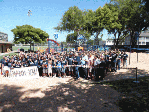 The ribbon of helping hands was cut to officially open the park