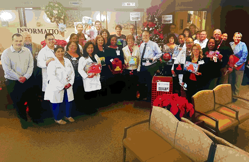 City of Lakewood, Vice Mayor, Diane DuBois and Lakewood Regional Medical Center, CEO, John Grah, accompanied by hospital staff during holiday toy drive.